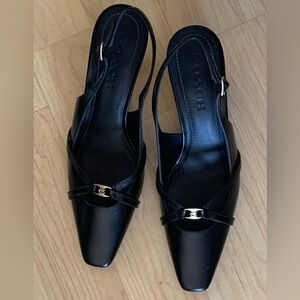Coach Rowyn Black Leather Slingback Mules with Gold Accent